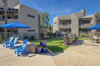 Garden courtyard with grills and fireplace